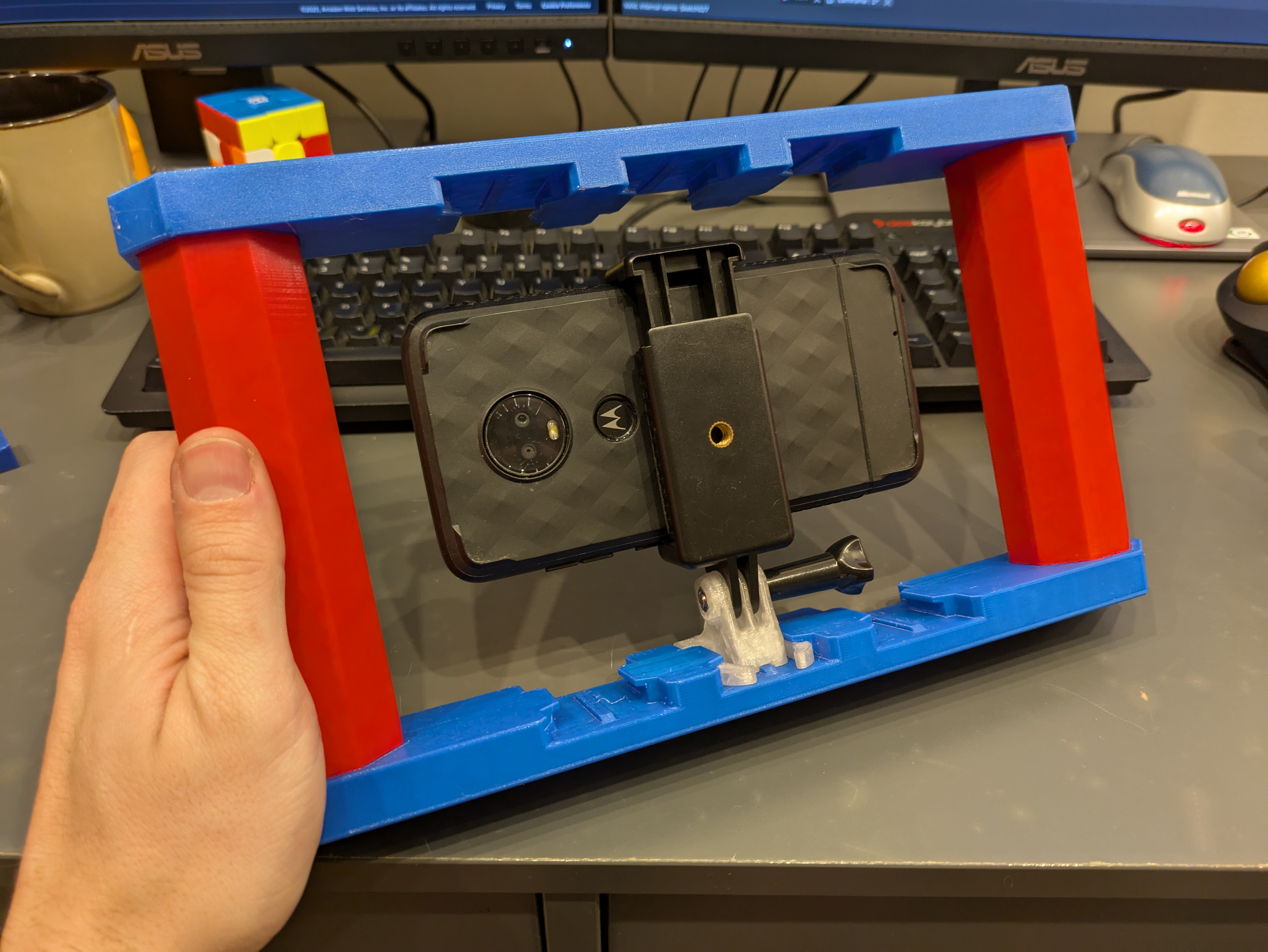 This even works with a large smartphone. I put multiple different mounting points on the upper and lower plates so you can choose your own adventure when filming.