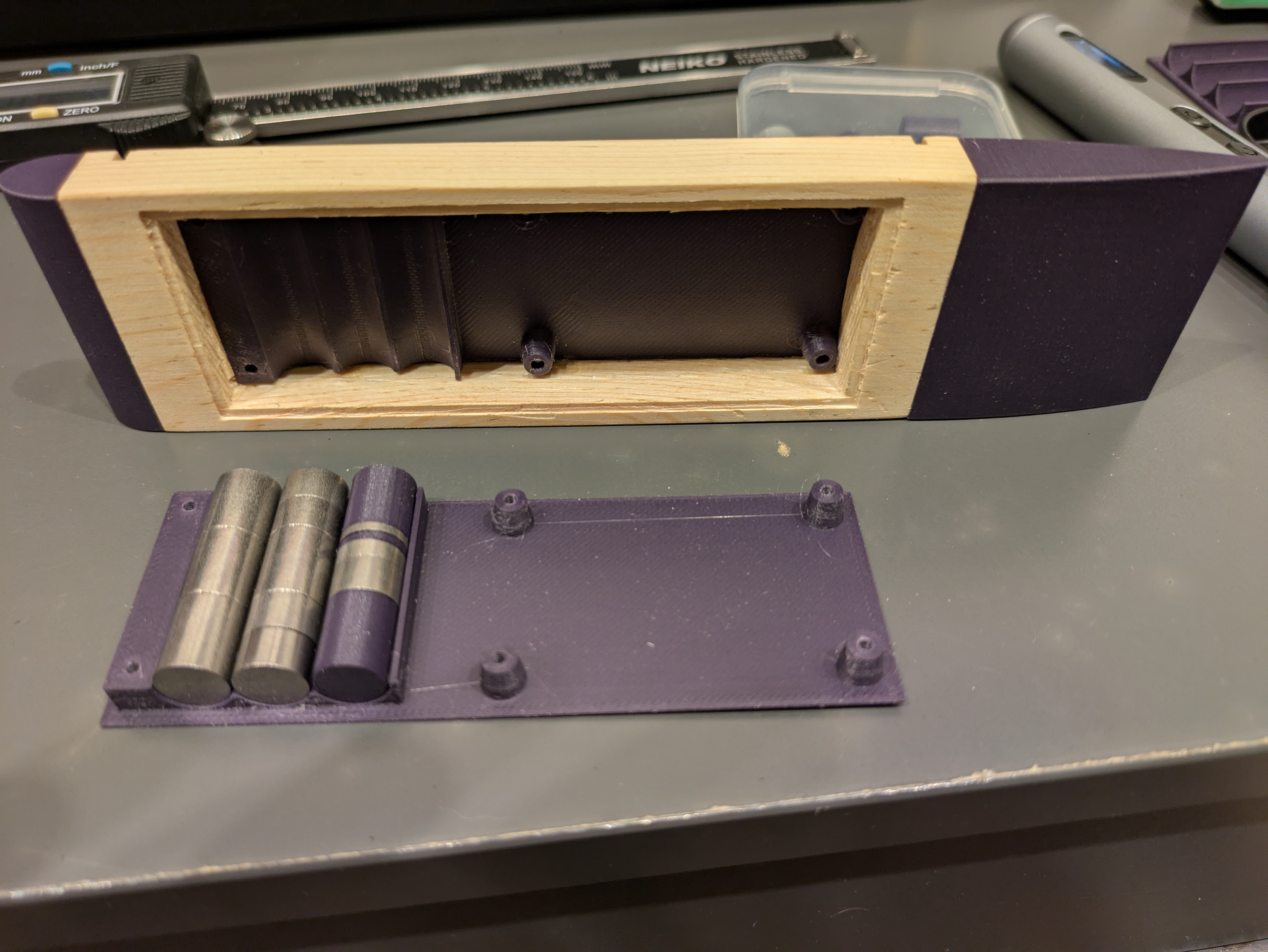 You can see how the weights mount inside the frame. This design allows for us to tweak the weight to exactly meet the 5 ounce weight limit.