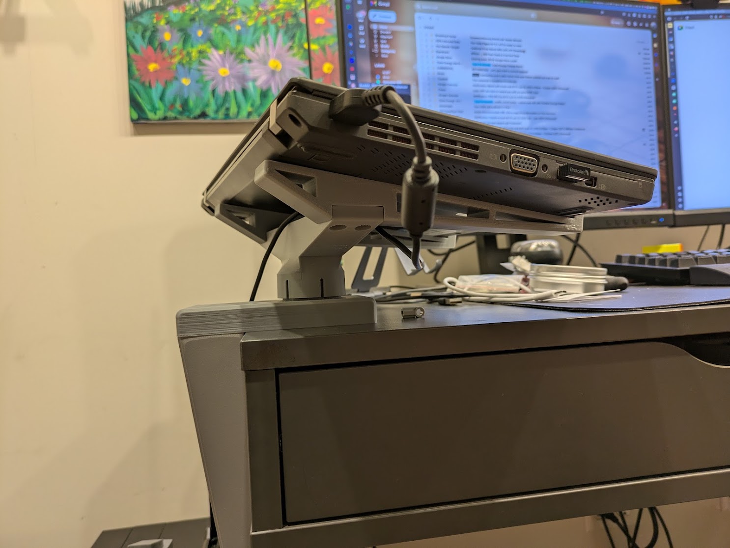 Fully assembled, you can see how the arms bolt to the swivel.