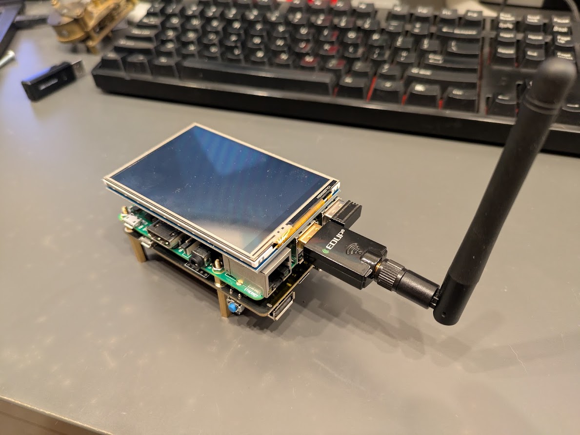The UPS + TFT screen + Raspberry Pi all stacked together. Now for some POWER!
