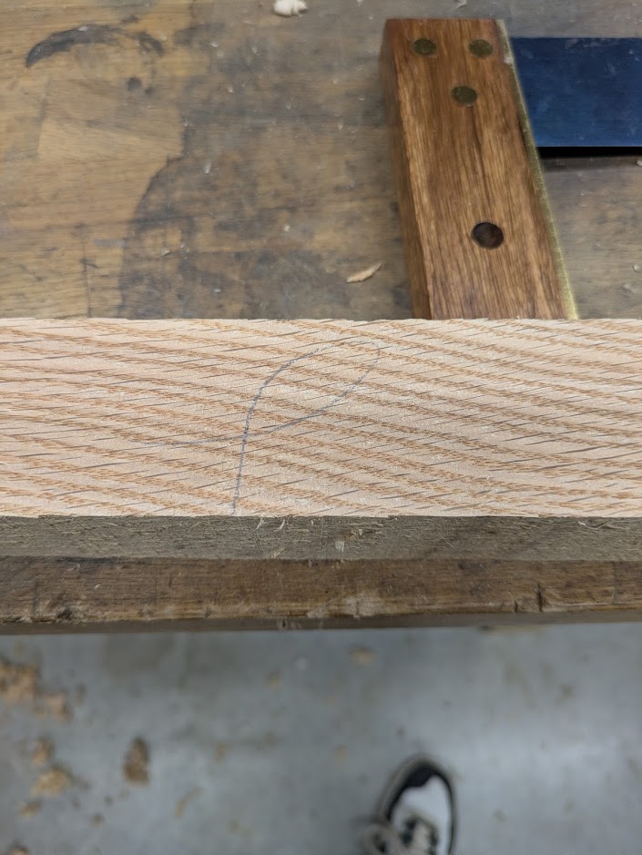 Using this old mark tells the woodworker this is a reference face. A small arrow on the bottom edge will point to the reference edge.