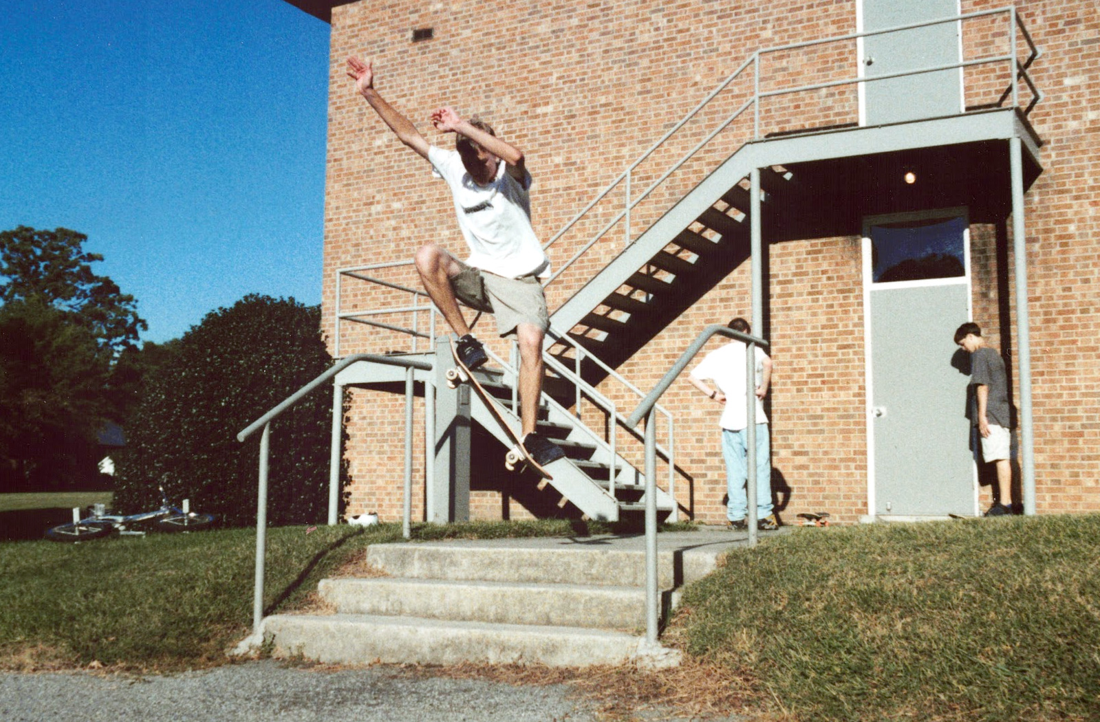 Alan doing what I assume is a front-side 180 off the Synagogue 3 stair.